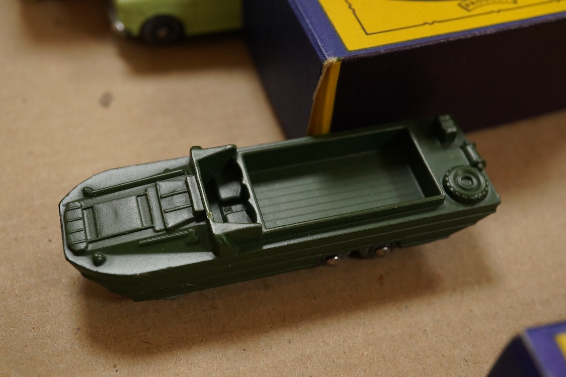Eleven boxed Matchbox Series 1-75 regular wheels vehicles; 46; Morris Minor, 48; Meteor sports boat and trailer, 50; Commer pick-up truck (creasing to one end of the box), 54; Saracen personnel carrier, 55; DUKW amphibia